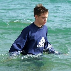 Sea swimmer in tracksuit
